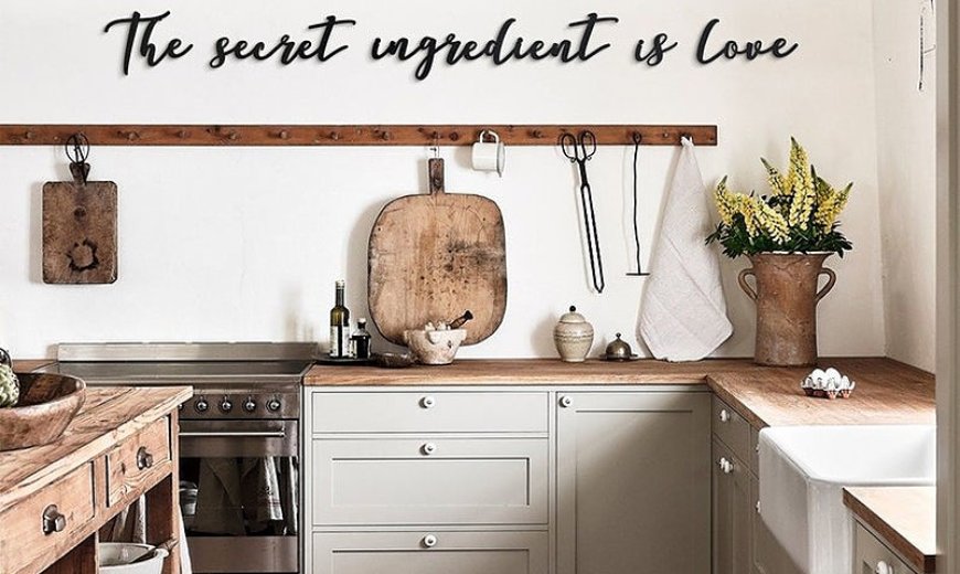Black-metal-statement-wall-decal-in-white-kitchen-wall