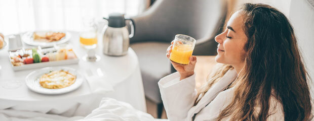 perfect girl after taking a bath in bedroom drinking