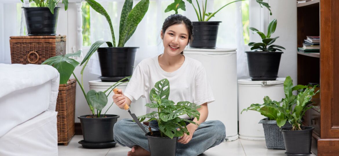 cute girl with plants smiling