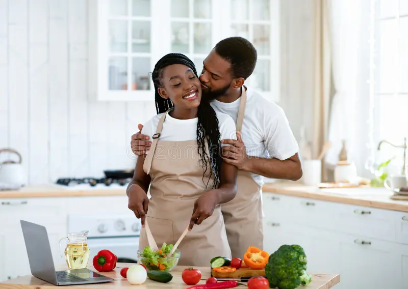 romantic-black-couple-kissing-cooking-healthy-food-together-kitchen-romantic-black-couple-kissing-cooking-healthy-208398674