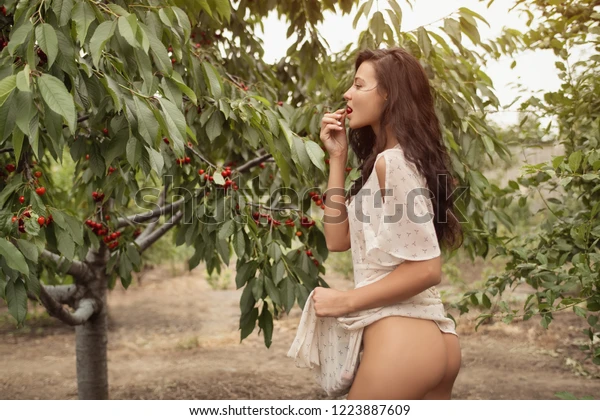 stunning-sexy-brunette-beauty-garden-600w-1223887609